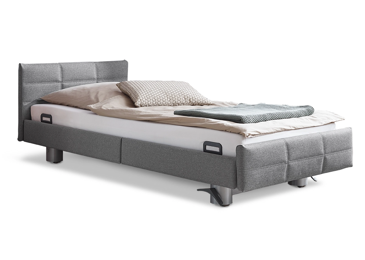 Regia Pflegebett in grau gesteppten Bezugstoff